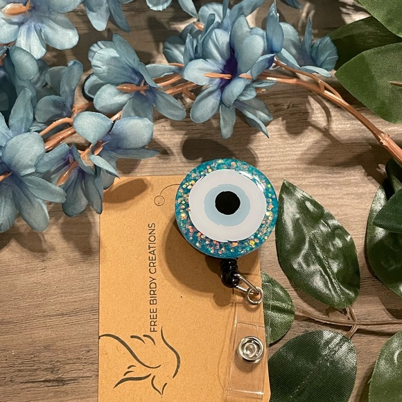 💙🧿 Evil Eye Badge Reel 💙🧿 - Picture 1 of 3
